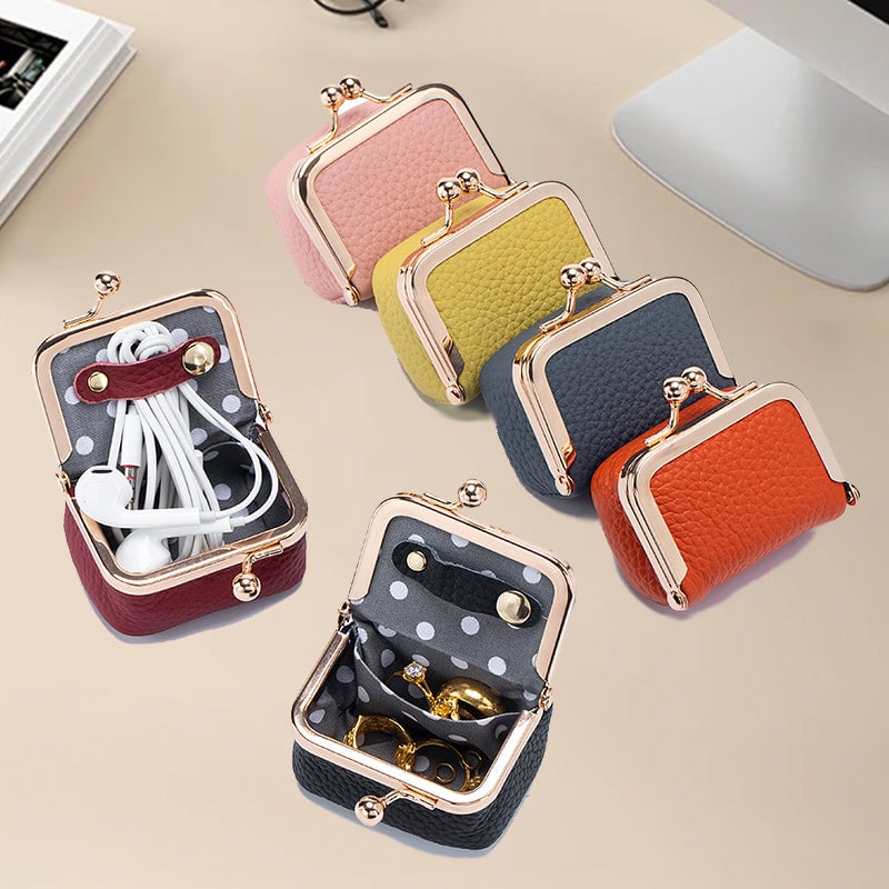 Mini leather cases used for jewelry and wired earbuds