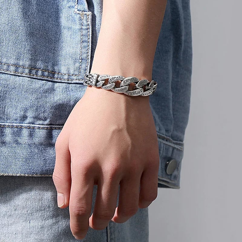 Side view showing engraved Cuban links
