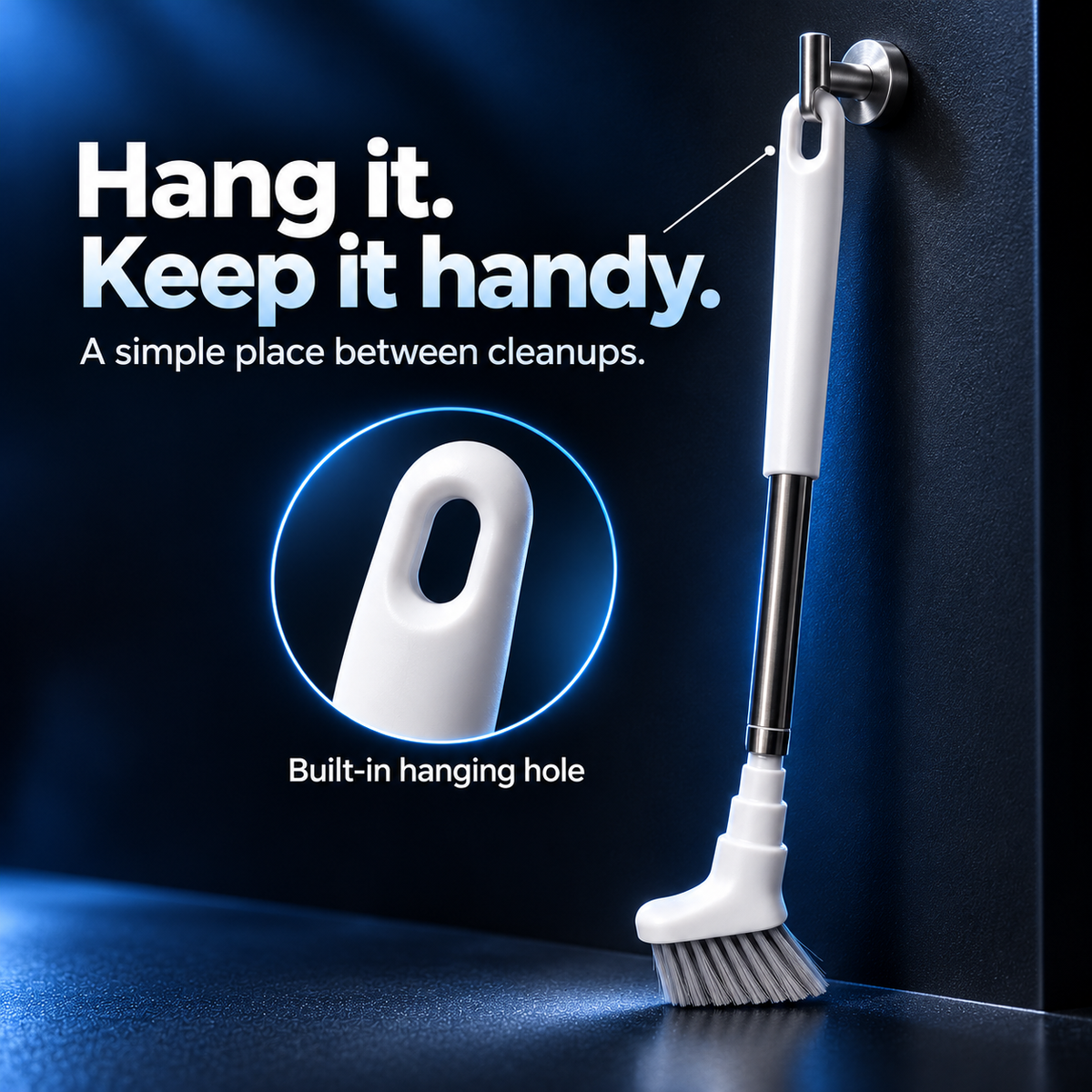 Extendable cleaning brush hanging vertically from a wall hook using its built-in handle opening