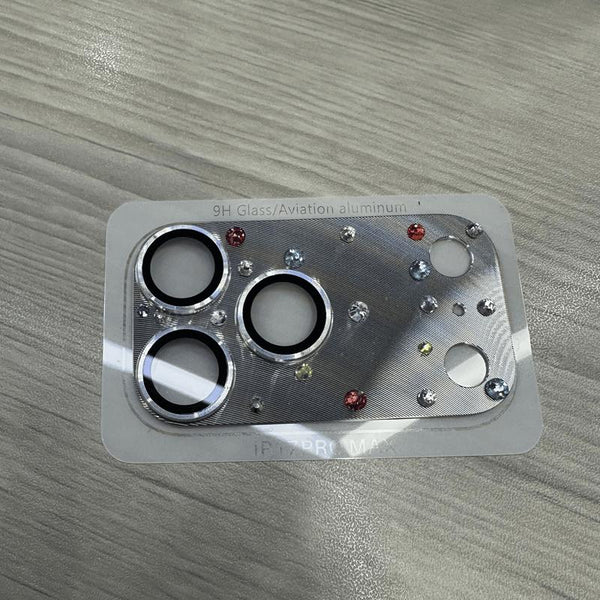 Silver CD-pattern camera lens protector with textured metallic-look surface and rhinestones