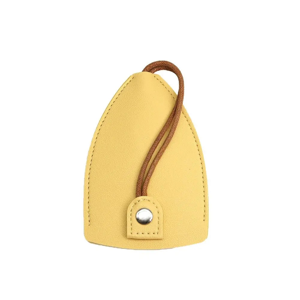 Yellow compact key holder pouch showing soft stitched construction